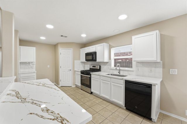 4706 Woodspring Glen Lane, Houston, TX 77345