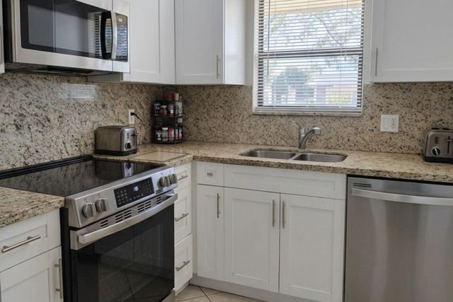 21911 Lake Forest Circle 103, Boca Raton, FL 33433