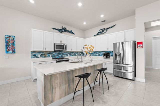7642 N Blue Spring Drive, Parkland, FL 33067
