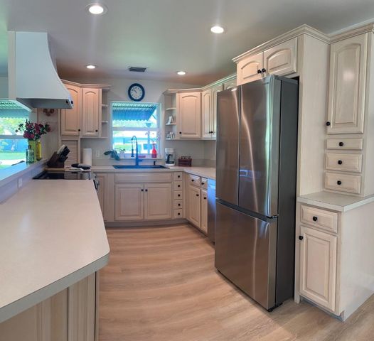 1521 Treemont Avenue, Jupiter, FL 33469