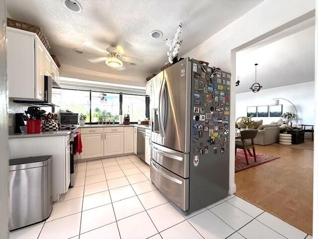 665 Deer Creek Hollows Circle, Deerfield Beach, FL 33442