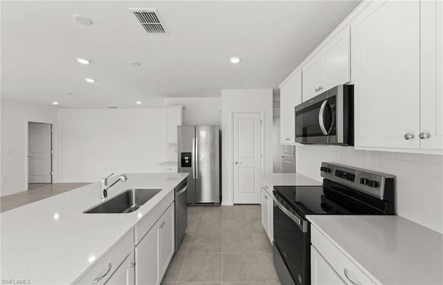 290 Silent Lake DR, Lehigh Acres, FL 33936