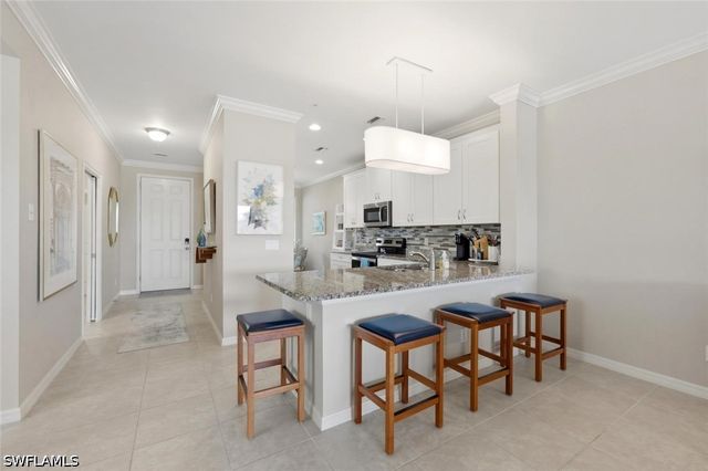 9440 Benvenuto CT 3-104, Naples, FL 34119
