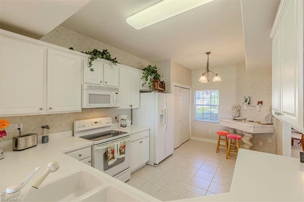 9195 Michael CIR 1303, NAPLES, FL 34113 — photo 2