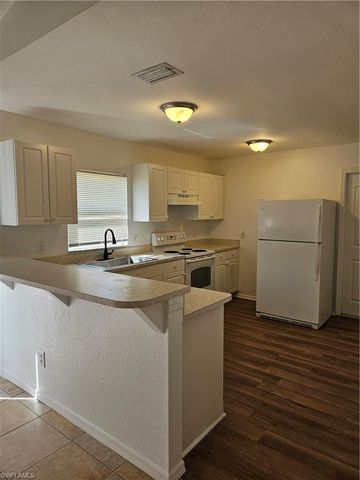 5215 3rd ST W, Lehigh Acres, FL 33971