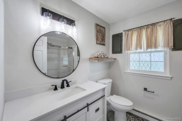248 Newcastle Court A, Ridge, NY 11961