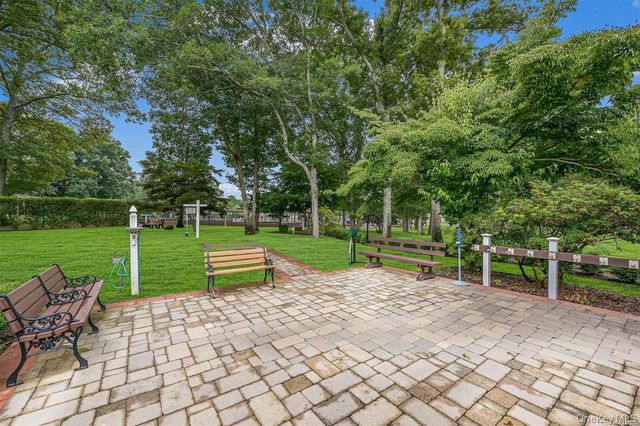 248 Newcastle Court A, Ridge, NY 11961