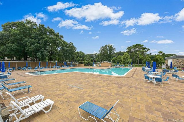 248 Newcastle Court A, Ridge, NY 11961