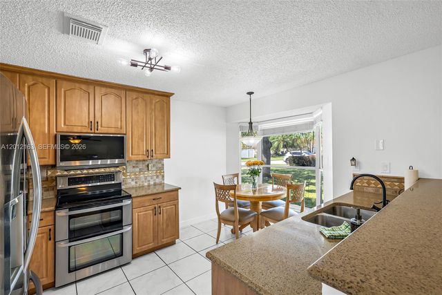 1910 NW 180th Way, Pembroke Pines, FL 33029