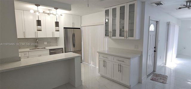 3310 S Meridian way B, Palm Beach Gardens, FL 33410