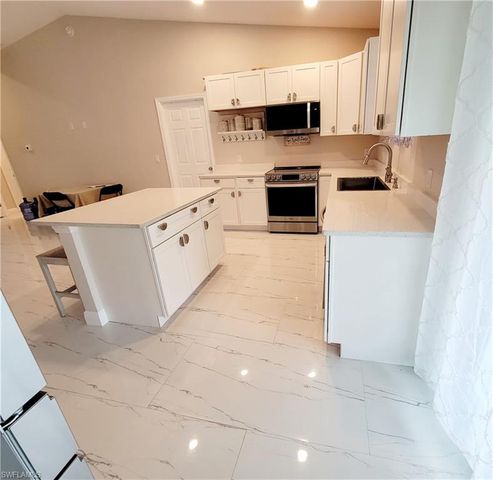 1138 Jaguar BLVD, Lehigh Acres, FL 33974