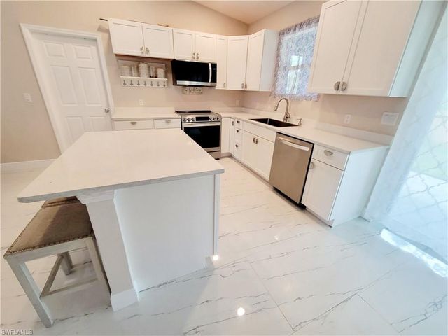 1138 Jaguar BLVD, Lehigh Acres, FL 33974