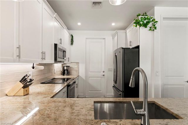 7598 Rockefeller DR, Naples, FL 34119