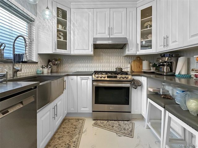 9931 213th Street, Queens Village, NY 11429