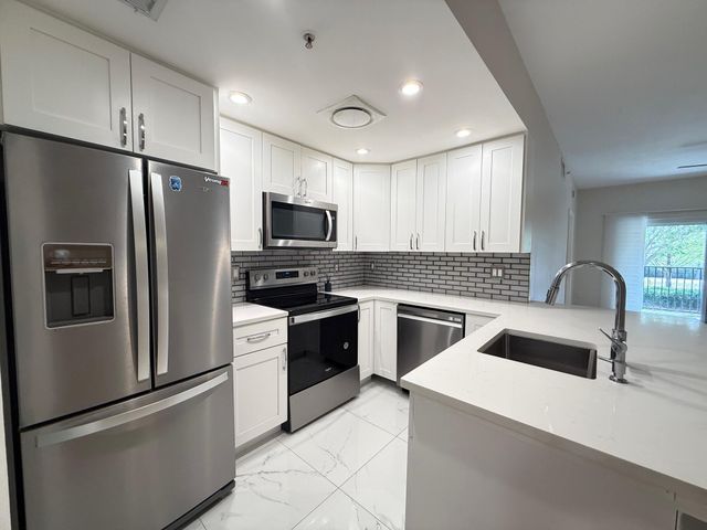 5860 W Sample Road 202, Coral Springs, FL 33067