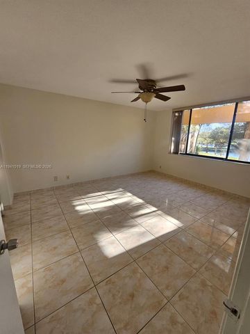 8592 W Sunrise Boulevard 209, Plantation, FL 33322