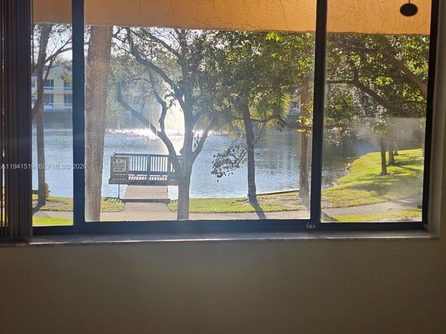 8592 W Sunrise Boulevard 209, Plantation, FL 33322