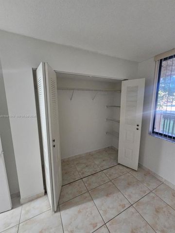 8592 W Sunrise Boulevard 209, Plantation, FL 33322