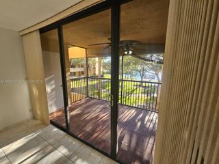 8592 W Sunrise Boulevard 209, Plantation, FL 33322