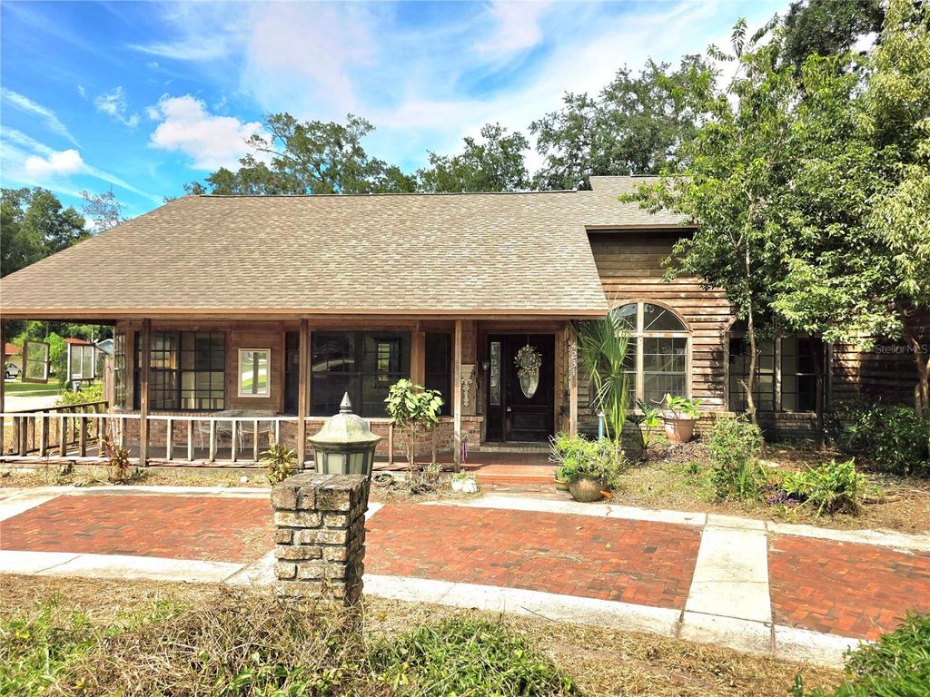 Image 1 of property listing at 4231 TALL TREE DRIVE, Orlando, FL 32810