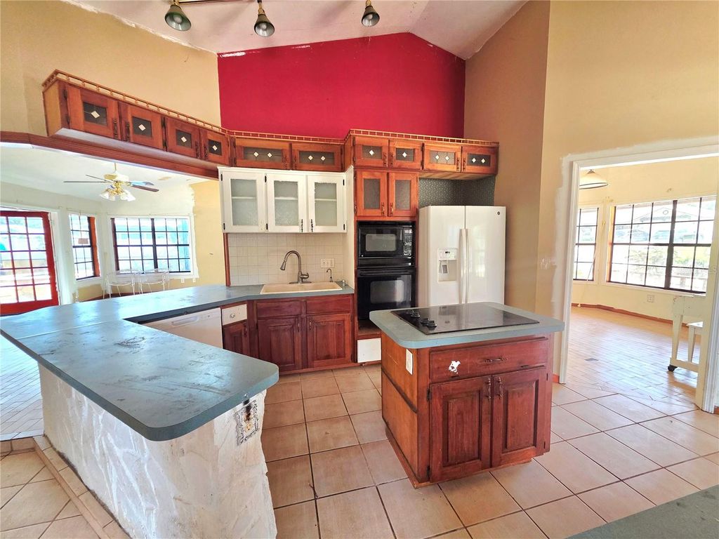 Image 32 of property listing at 4231 TALL TREE DRIVE, Orlando, FL 32810