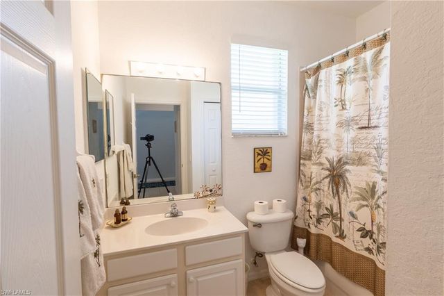 7755 Berkshire Pines DR, Naples, FL 34104
