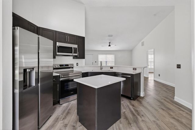 1714 SE Aneci Street, Port St. Lucie, FL 34983