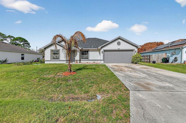 1714 SE Aneci Street, Port St. Lucie, FL 34983