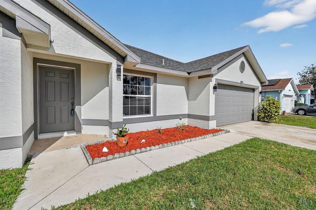 1714 SE Aneci Street, Port St. Lucie, FL 34983
