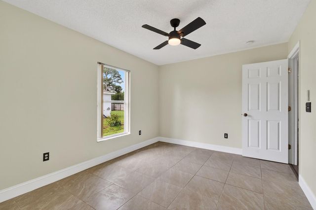 1714 SE Aneci Street, Port St. Lucie, FL 34983