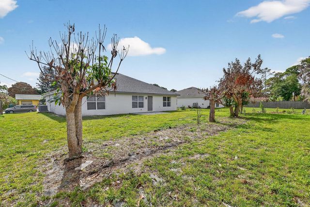 1714 SE Aneci Street, Port St. Lucie, FL 34983