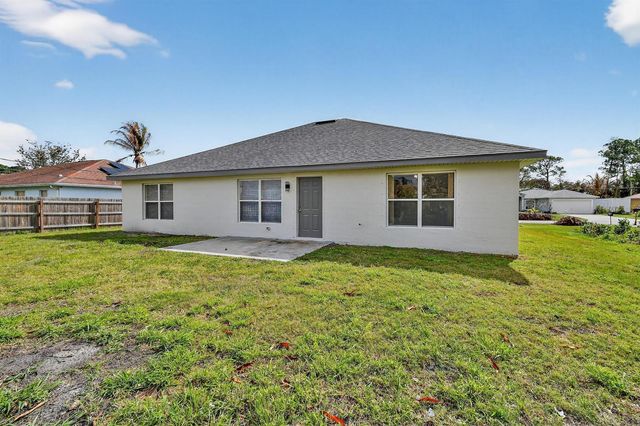 1714 SE Aneci Street, Port St. Lucie, FL 34983