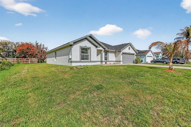 1714 SE Aneci Street, Port St. Lucie, FL 34983