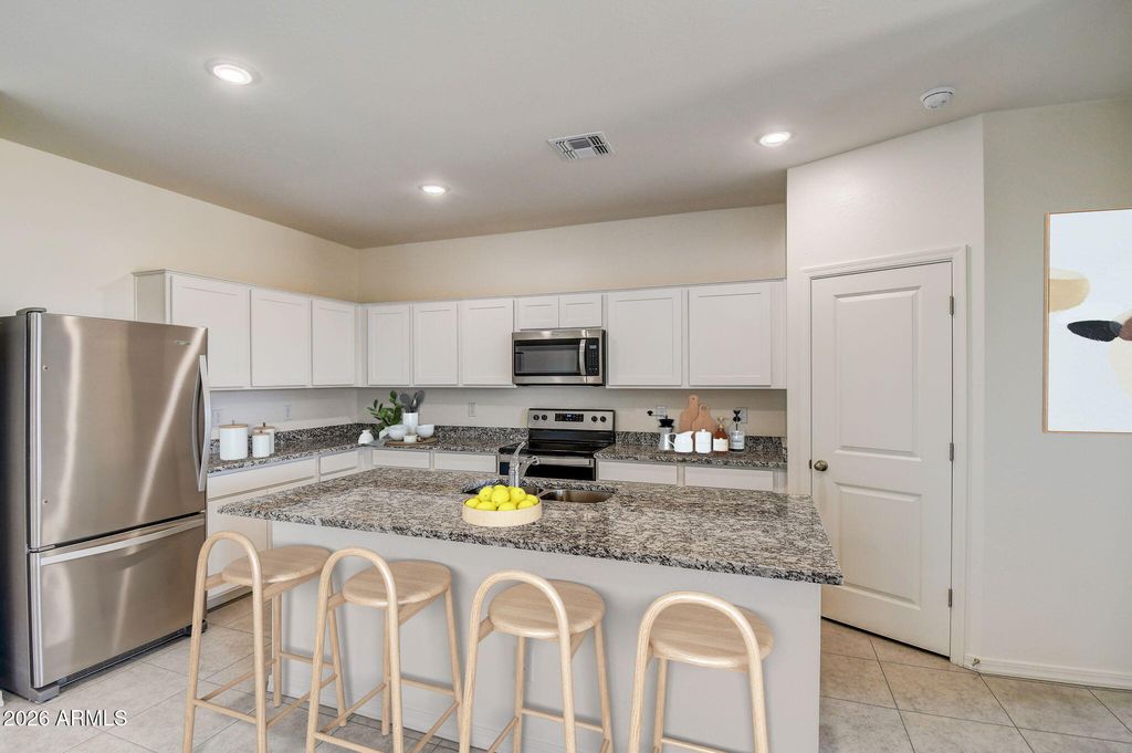 Image 9 of property listing at 47597 W COE Street, Maricopa, AZ 85139