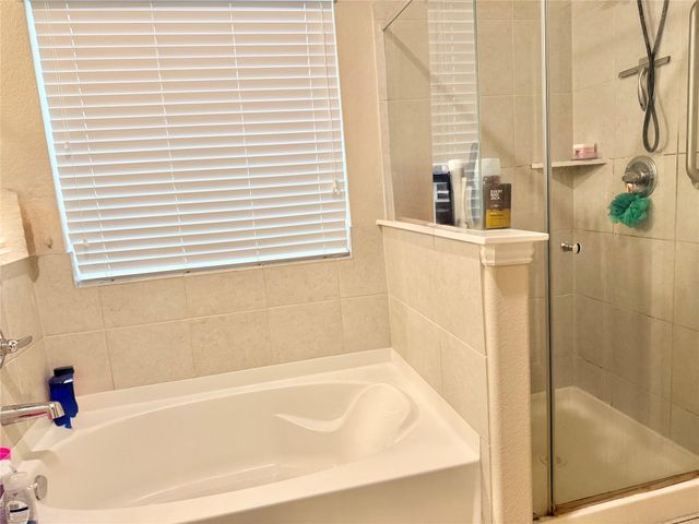 9903 Wood Wind Court, Baytown, TX 77521