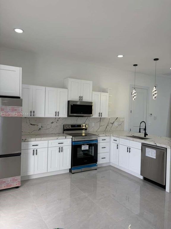 726 Clancy St E, Lehigh Acres, FL 33974