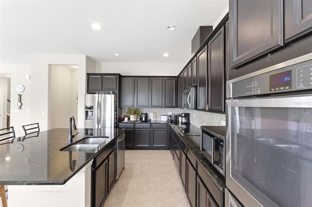 4924 BUTLER NATIONAL DRIVE, Wesley Chapel, FL 33543