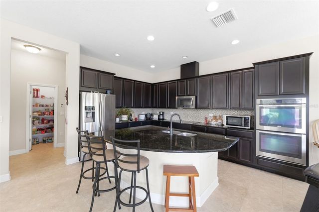 4924 BUTLER NATIONAL DRIVE, Wesley Chapel, FL 33543