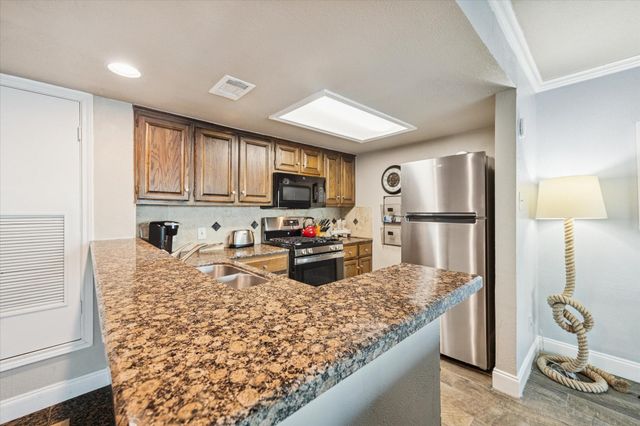 7041 Kingston Cove Lane 155, Willis, TX 77318