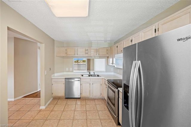 7784 Emerald Cir Apt 203, Naples, FL 34109