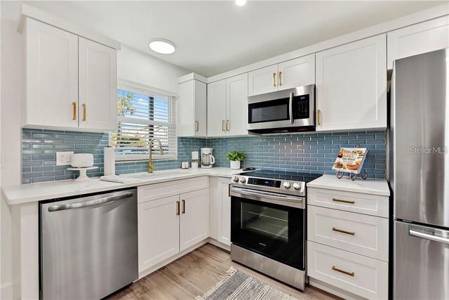 7003 SUNSET WAY 4, St Pete Beach, FL 33706