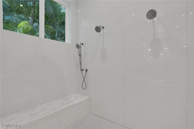 555 Whispering Pine LN, Naples, FL 34103