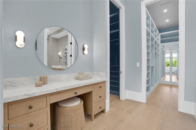 555 Whispering Pine LN, Naples, FL 34103