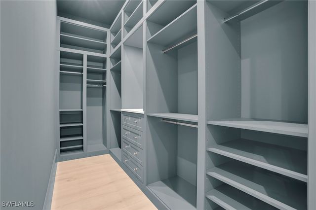 555 Whispering Pine LN, Naples, FL 34103