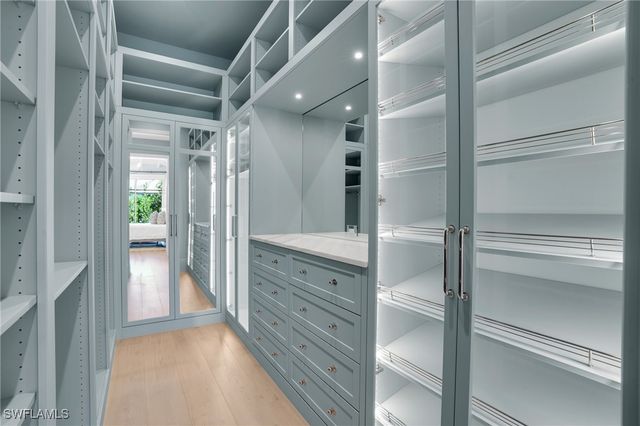 555 Whispering Pine LN, Naples, FL 34103