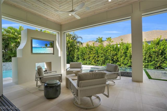 555 Whispering Pine LN, Naples, FL 34103