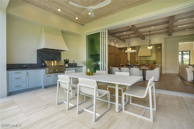 555 Whispering Pine LN, Naples, FL 34103