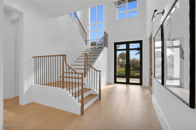 555 Whispering Pine LN, Naples, FL 34103