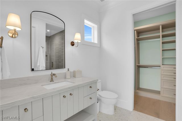 555 Whispering Pine LN, Naples, FL 34103