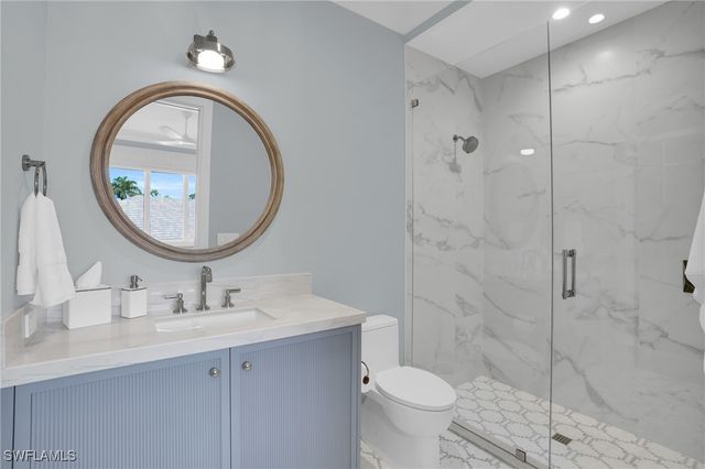 555 Whispering Pine LN, Naples, FL 34103